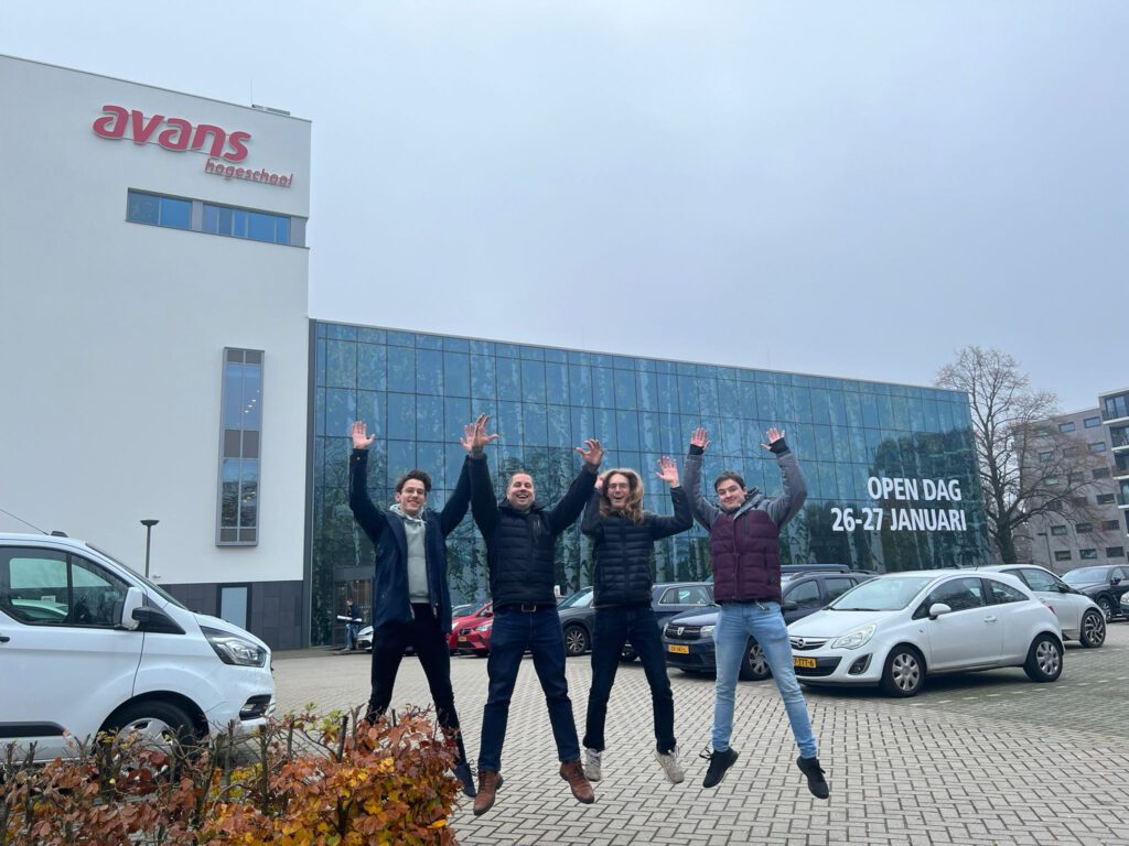 Team mid-jump in front of Avans ATIx