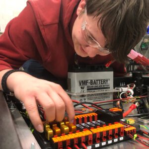 Finn connects a motor to the PDH