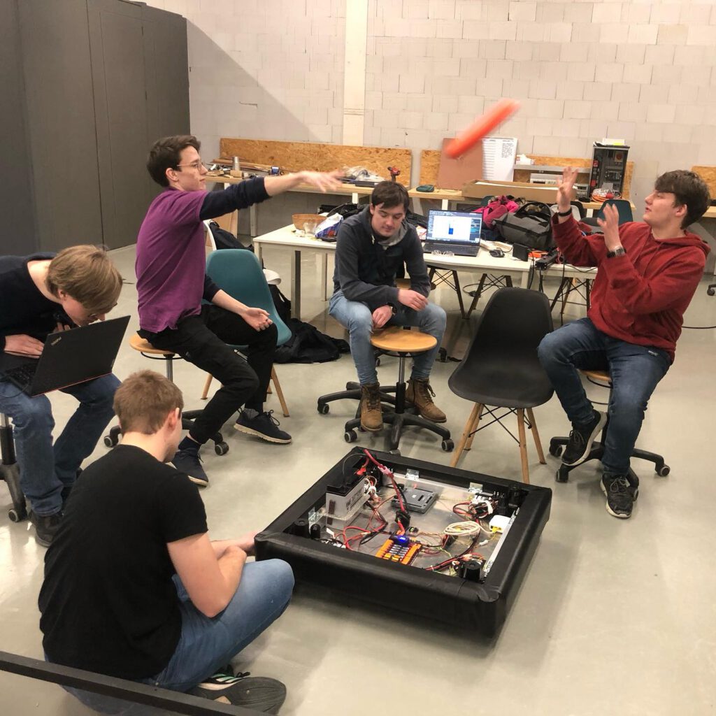 A ring is being thrown above the robot