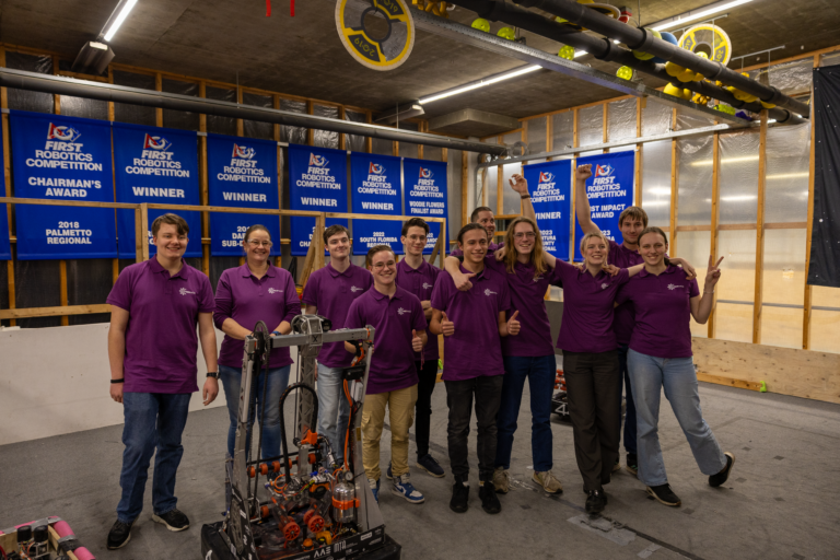 Team picture with the Rembrandts robot