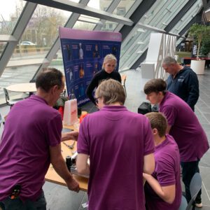 The team is discussing the electronics