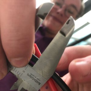 Sam measures the size of cables